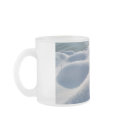 Detail of frozen river bank,ice,stone,sand,water.. mugs