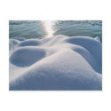 Detail of frozen river bank,ice,stone,sand,water.. postcards