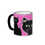 Dibujo retro de ojos verdes de tres gatos negros taza de café