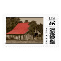 Dilapidated Red-Roofed Barn Postage Stamp