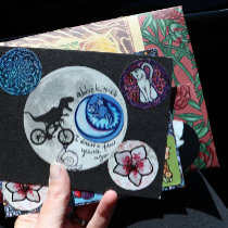 Dinosaur on a Bike In Sky With Moon Greeting Card