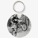 Dirt bike wheeling in the woods keychains by essie1153 Dirt bike wheeling in the woods keychains