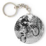 Dirt bike wheeling in the woods key chains