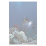 Diver shooting video on coral bed stationery paper