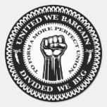 Divided We Beg Sticker