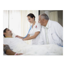 Doctor and nurse tending to patient post cards