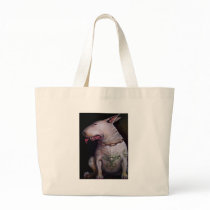 Dogs eat cats tote bags