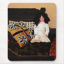 Doll on Couch Mouse Pads