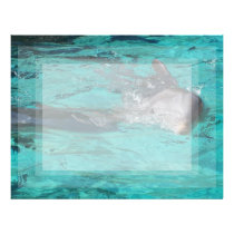 dolphin coming out of teal water full page letterhead