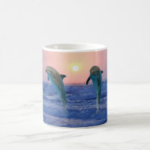 Dolphins at sunrise coffee mugs