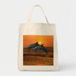 Dolphins at sunset canvas bag