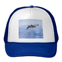 Dolphins in the clear blue sea trucker hat