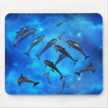 Dolphins swimming in the ocean mousepads