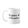 Don't let the bastards grind you down. coffee mugs