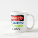Dr. Electro at work mugs