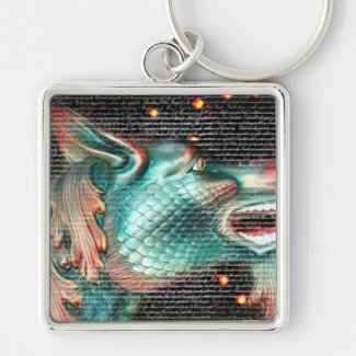 dragon statue with text overlay pic keychain