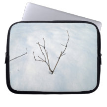Dried branch on a snowy landscape laptop computer sleeve