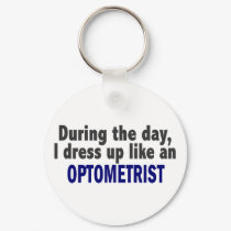 During The Day I Dress Up Like An Optometrist keychains