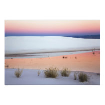Dusk sky reflected in pool of water from