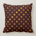 Earth toned polka dots on a pillow
