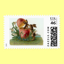 Easter bunnies with pink egg postage
