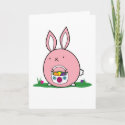 Easter bunny holding a basket with eggs card