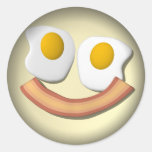 Eggs and bacon smiley face . round sticker