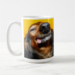 El Snuggle fastidia la taza sonriente