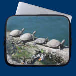 Electronics bag featuring family of turtles laptop sleeves