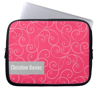Elegant swirls on pink laptop sleeve