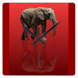 ELEPHANT ON RED CLOCKS