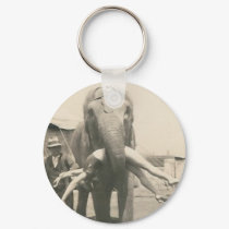 elephant with girl in mouth keychain