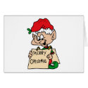 elf with merry christmas sign