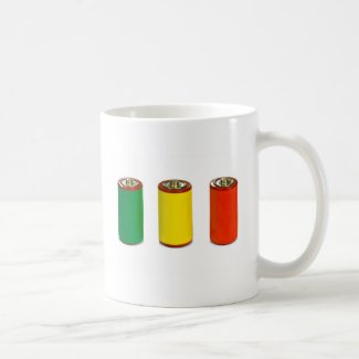 energy management concept - green, red and yellow coffee mugs