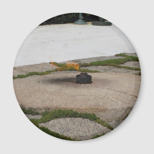 The eternal flame at the monument for JFK in Arlington National Cemetery, which is such a beautiful and serene resting place for America's fallen soldiers. Beautiful Photograph taken by Amy Marie.  Copyright Amy Marie.