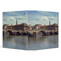 Europe, Italy, Florence. The Arno River flows Binders