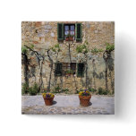 Europe, Italy, Monteriggioni. A stone house is Button