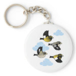 Evening Grosbeaks in flight Basic Keychain