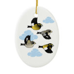 Evening Grosbeaks in flight Oval Ornament