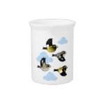 Evening Grosbeaks in flight Pitcher