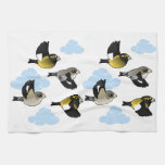 Evening Grosbeaks in flight Kitchen Towel