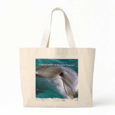 Everyone smiles in the same language. canvas bag by Dolfins4ever