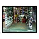 exhausted shoe salesmen in kuala lumpur, malaysia posters