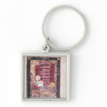 Ezra writing the sacred books keychains