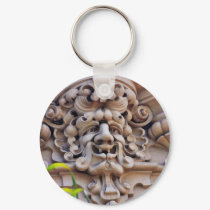 Face In Stone On Buildings Wall keychains by lifesphere Face In Stone On Buildings Wall keychains
