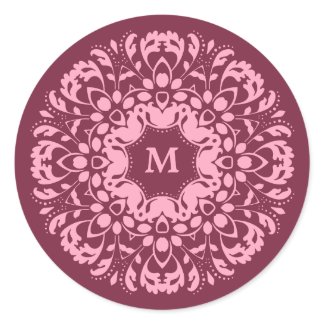 Fancy pink victorian motif on burgundy monogram