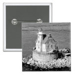 Faro de la roca de la raza pins