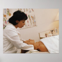Female chiropractor massaging a patient poster
