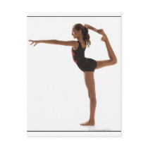 Female gymnast (12-13) balancing on one leg postcards