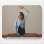 Female gymnast (12-13) performing splits mouse pads